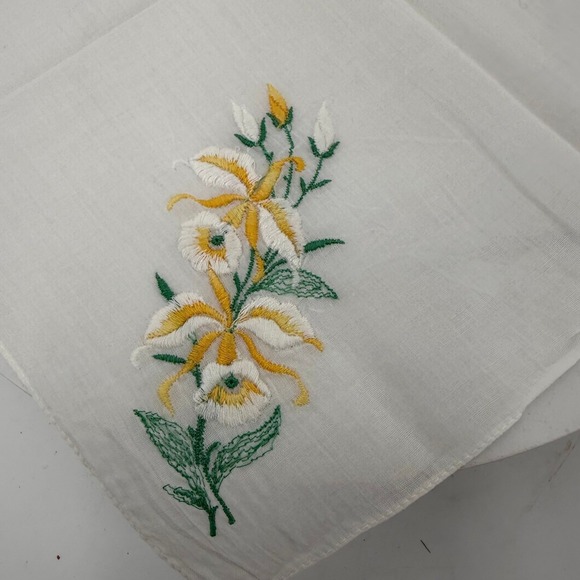 The Unbranded Brand Other - Vtg handkerchief featuring delicate yellow and green embroidered lily flowers.